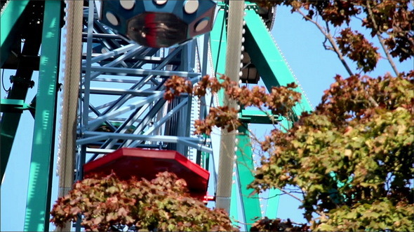 Martian Themed Ferris Wheel Moving Blue Sky
