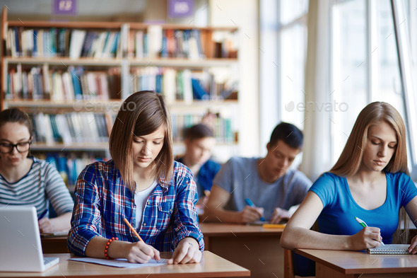 Studying in college - Stock Photo - Images