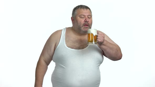 Overweight Man with Glass of Beer on White Background alt
