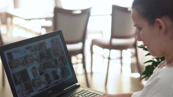 Side View Authentic Young Woman Chatting On Laptop At Home In Living Room alt