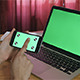 Girl Using her Phone with Green Screen Laptop - VideoHive Item for Sale