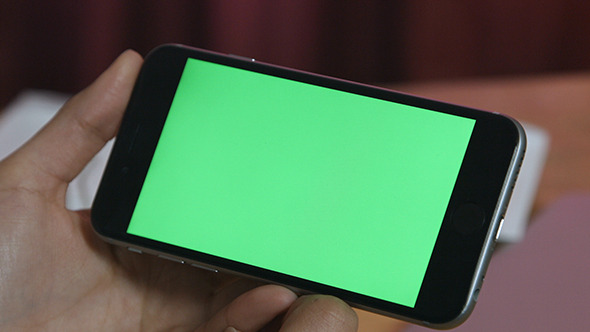 Girl Holding Smartphone with Green Screen