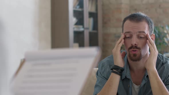 Depressed Man in Therapy Session alt