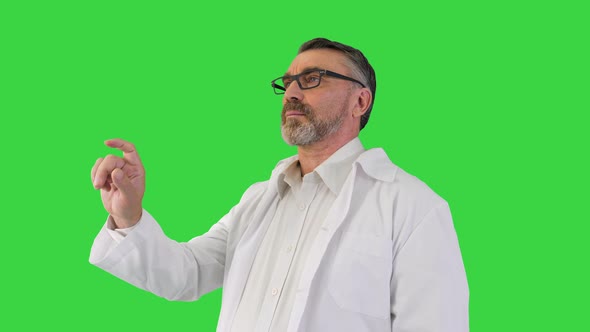 Doctor Is Touching Digital Virtual Screen on a Green Screen Chroma Key alt