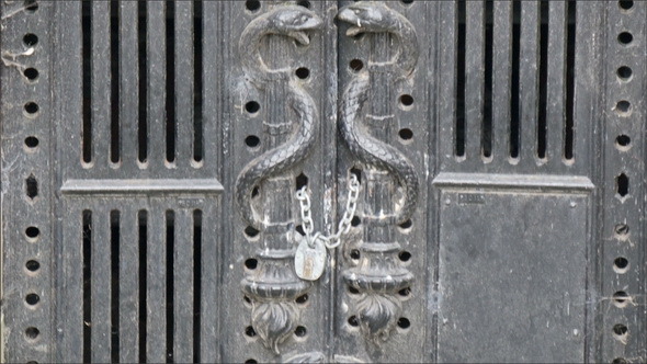 The Big Black Gate with Carvings on it