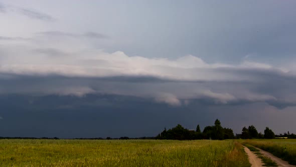 Dark storm clouds, supercell storm in Europe, climate change concept