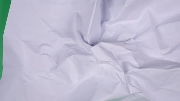 Stop motion animation paper wrinkles green screen.