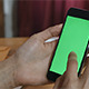 Girl Using Smartphone with Green Screen - VideoHive Item for Sale