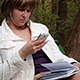  Girl With Mobile Phone in Park - VideoHive Item for Sale