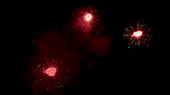 Many flashing colourful fireworks in event amazing with black background. alt