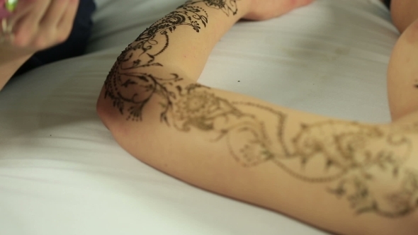 Henna Body Painting. View Of Naked Model Posing alt