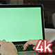 Girl Typing on Laptop with Green Screen - VideoHive Item for Sale