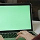 Girl Using Laptop with Green Screen - VideoHive Item for Sale