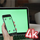 Holding Phone with Green Screen Laptop - VideoHive Item for Sale