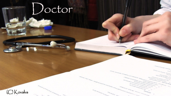 Doctor Writing The Note