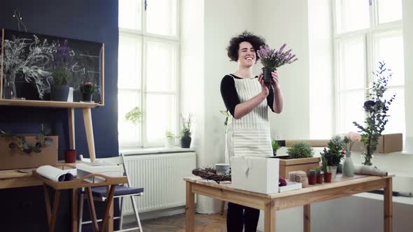 Florist packing box with flowers ordered by client alt