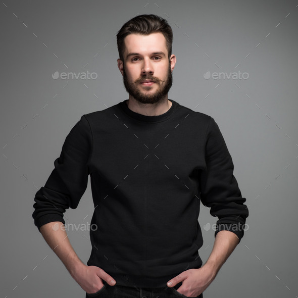 Fashion portrait of young man in black - Stock Photo - Images