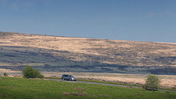 Cars On Hillside On Hot Summer Day alt