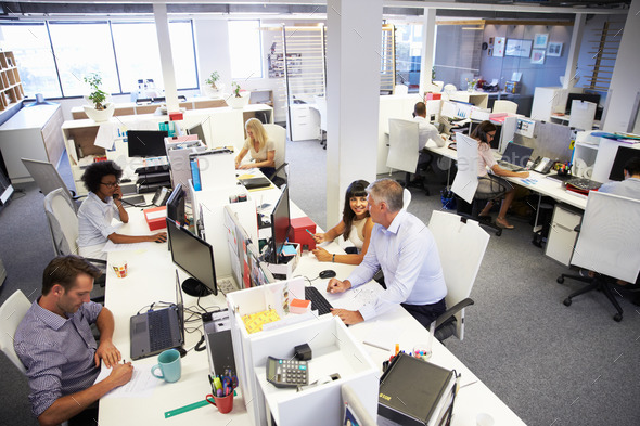 People working in a busy office - Stock Photo - Images