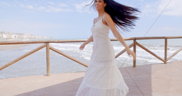 Playful Lady In White Enjoying At Beach Pathway alt