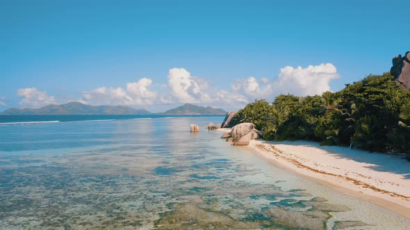 Aerial Drone  Footage of Unique Tropical Anse Source D'argent Beach on La Digue Island Seychelles alt