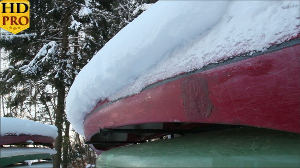 Colorful Boats Covered with Snow