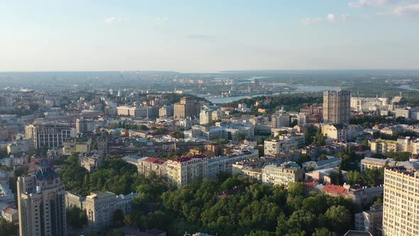 Aerial drone video of downtown skyline buildings and Dnipro river in Pecherskyi district of Kyiv Obl alt