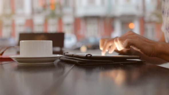 Man Hands Typing on Tablet PC alt