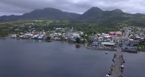 Aerial View Of The City Of Portsmouth And The Beautiful Scenery Of The Dominica Mountains alt