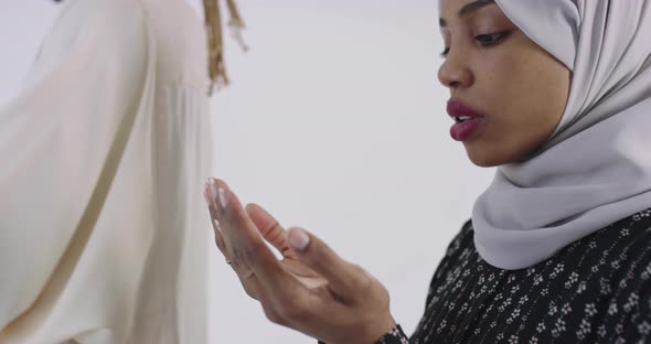 African Black Muslim Couple at Home in Ramadan Making Traditional Fatiha Prayer To Allah God While alt