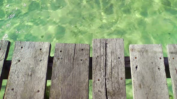 Wooden Pier And Tropical Water alt