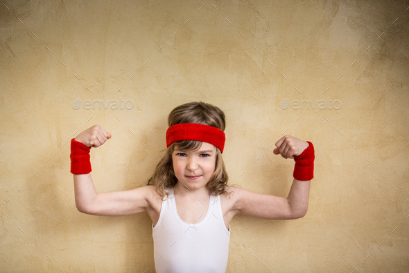 Funny strong child - Stock Photo - Images