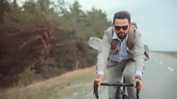 Harrying Businessman Commuter On Bicycle Traveling Work. Businesspeople Commute Lifestyle. alt