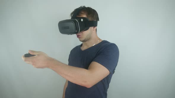 Man In The Helmet Of Virtual Reality In A Simulation Game