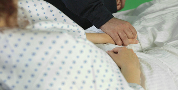 Female Patient has Hand Held Reassuringly