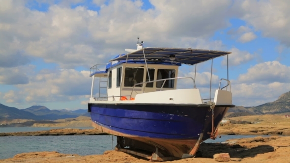 Big Boat Standing On The Seashore