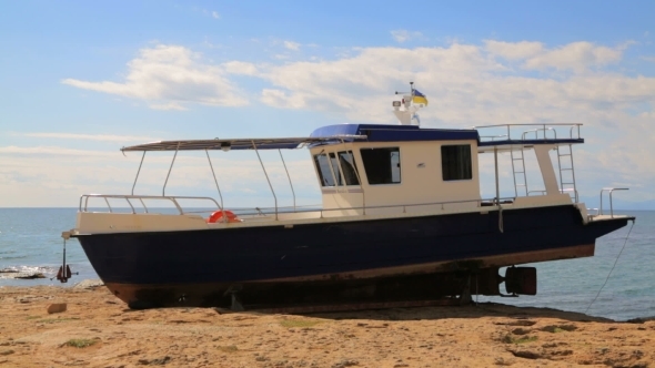 Big Sailboat Standing On The Seashore