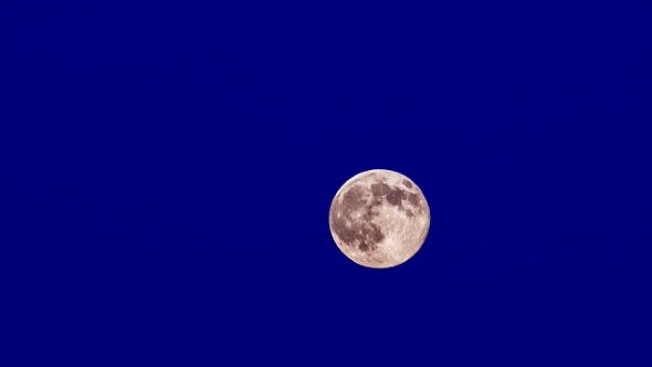 The Full Bright Moon Moves On Blue Background