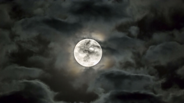 Bright Moon Among Moving Clouds