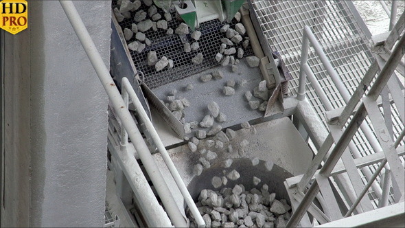 Rocks Slowly Dropping from a Conveyor