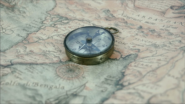 A Compass in the Middle of the Map alt