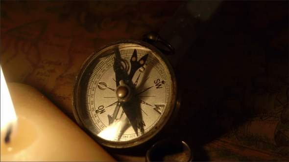 Zoom in View of the Compass and the Candle