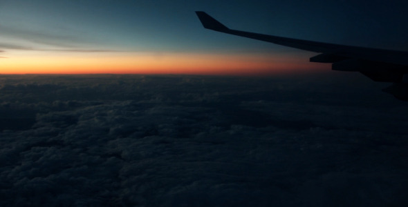 Clouds Passing By Seen Through Airplane Window alt