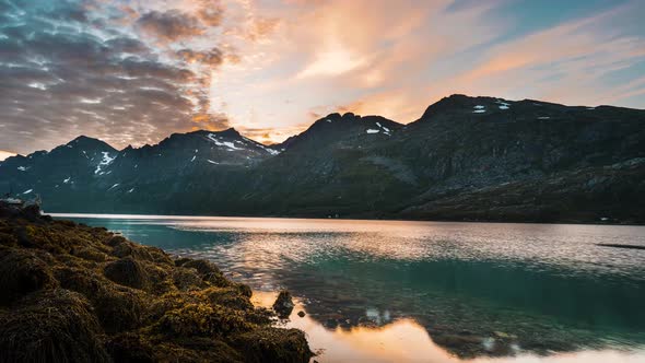 amazing panoramic timelapse of Ersfjorden in Northern Norway. The sky reflecting beautifully in the alt