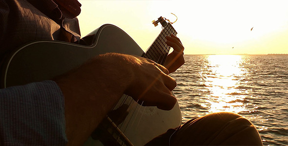 Playing Guitar at Sunset 2