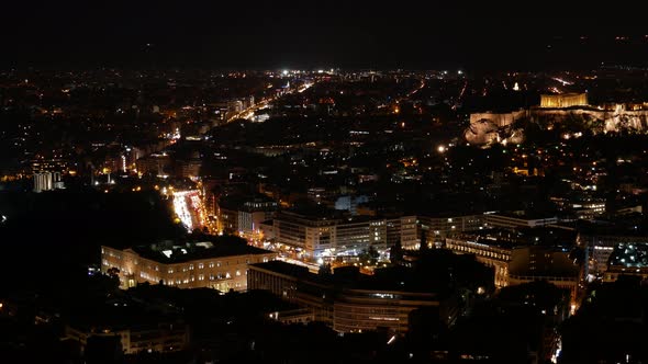 Aerial Night Timelapse of Athens downtown. Wide angle panorama with residential high-rise and small alt