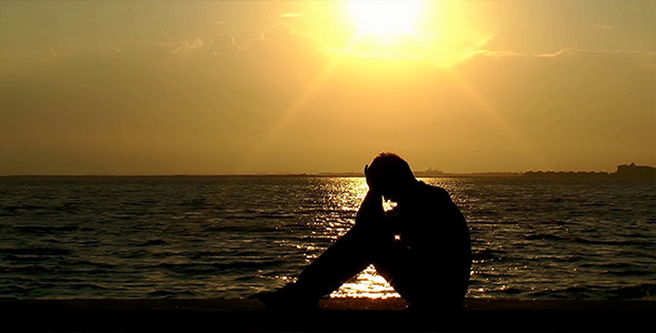 Depressed Man at Seaside