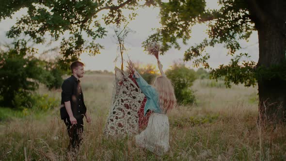 Joyful Hippie Lovers Dancing in Sunset  Freedom Concept alt