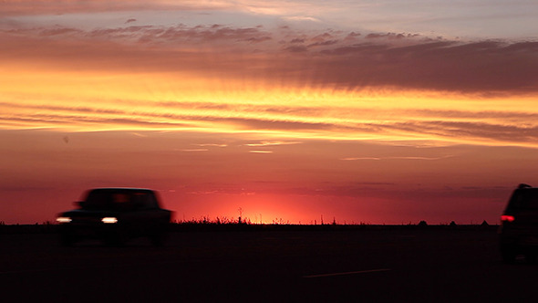 Driving Cars Silhouette in Sunset  alt