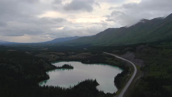 View of Peaceful Lakes and Scenic Road From Above alt